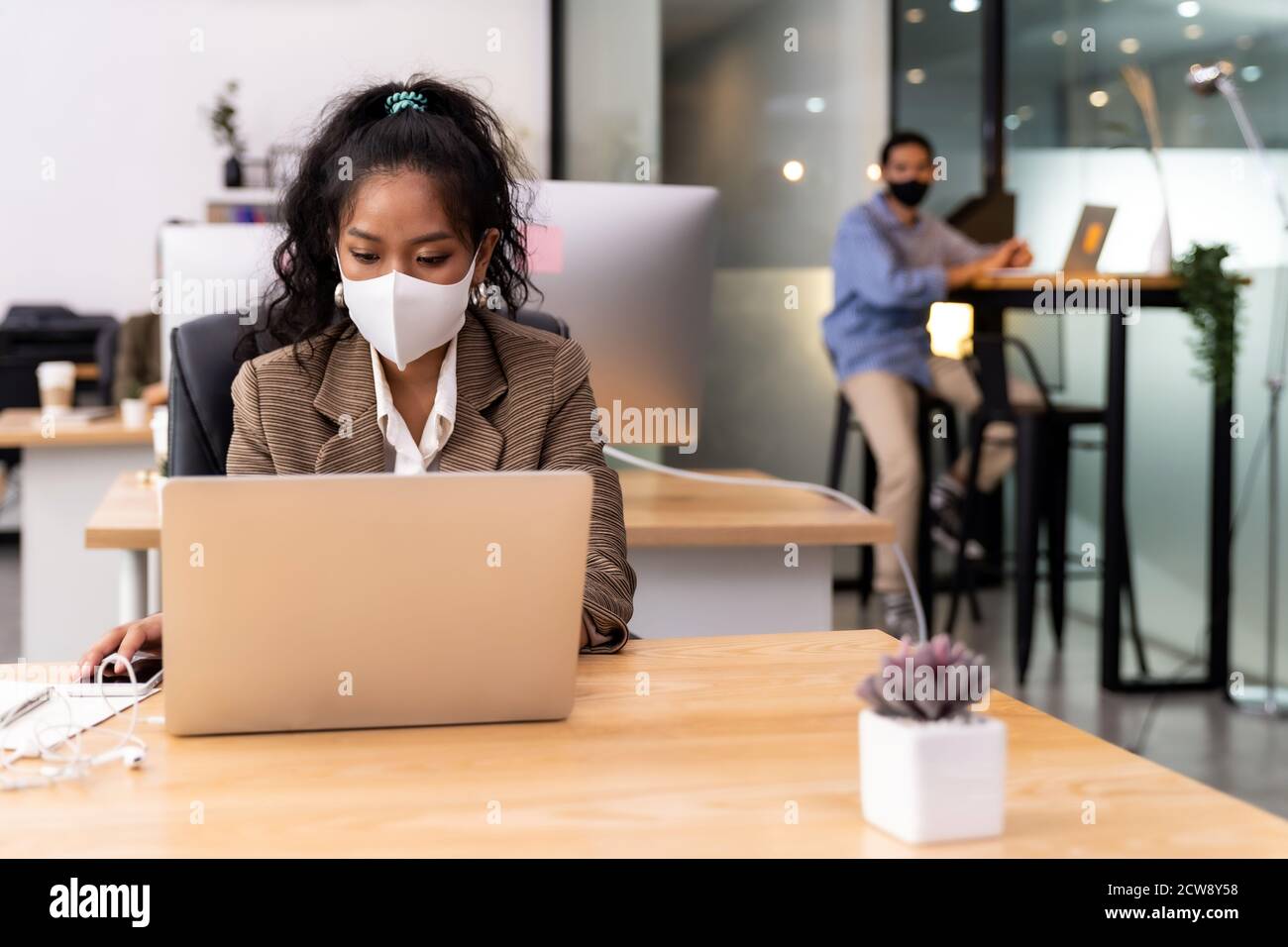 Mixed race of African black and asian business woman wear face mask ...
