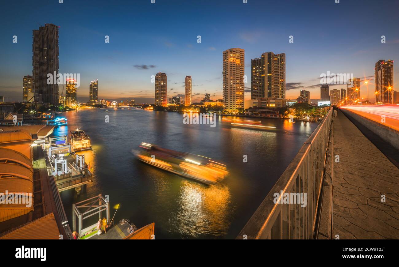 Skyscrapers and Light Trails of Traffic on the Chao Phraya River in ...