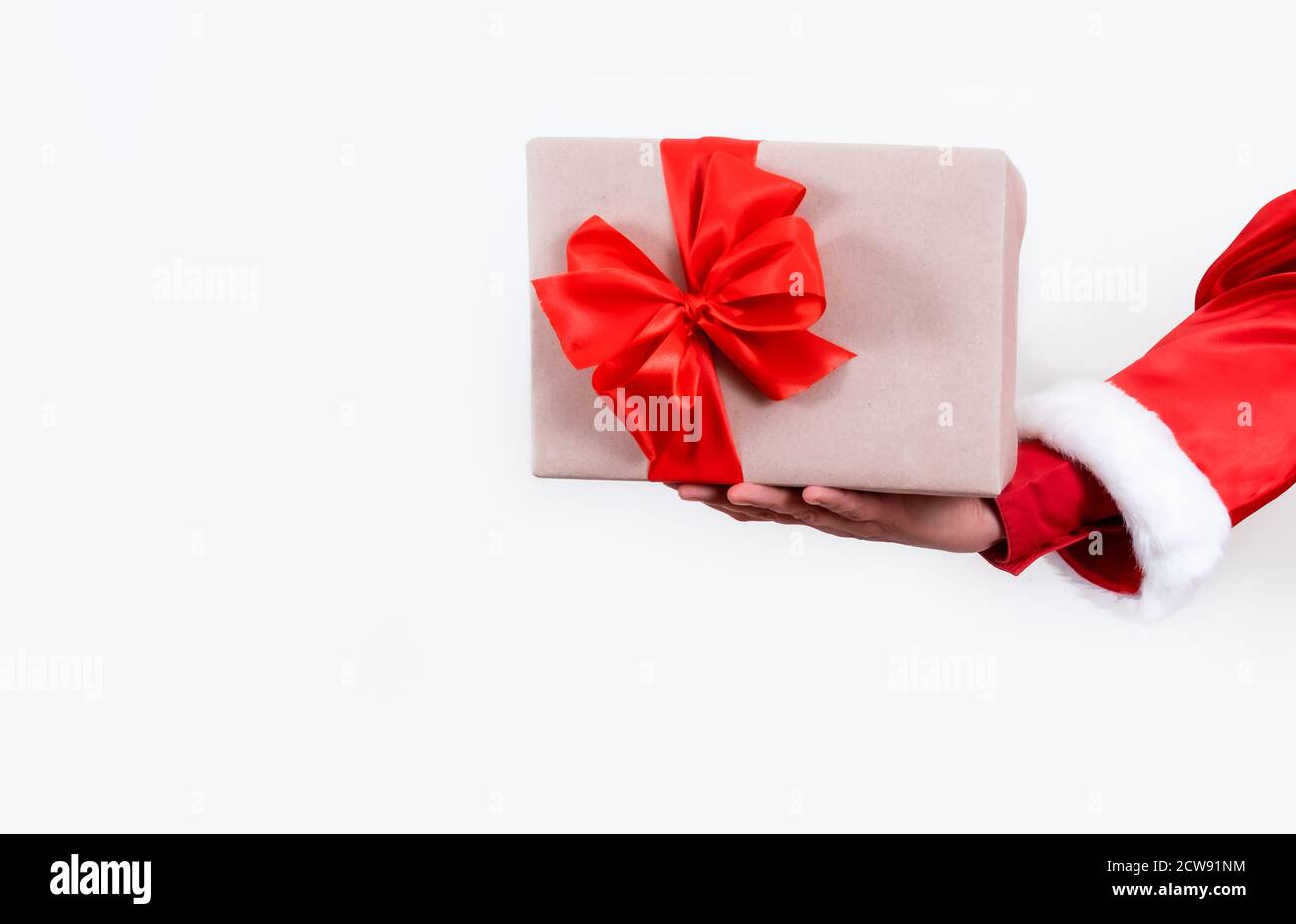 Hand of Santa Claus holds Packing boxes on the white background ...