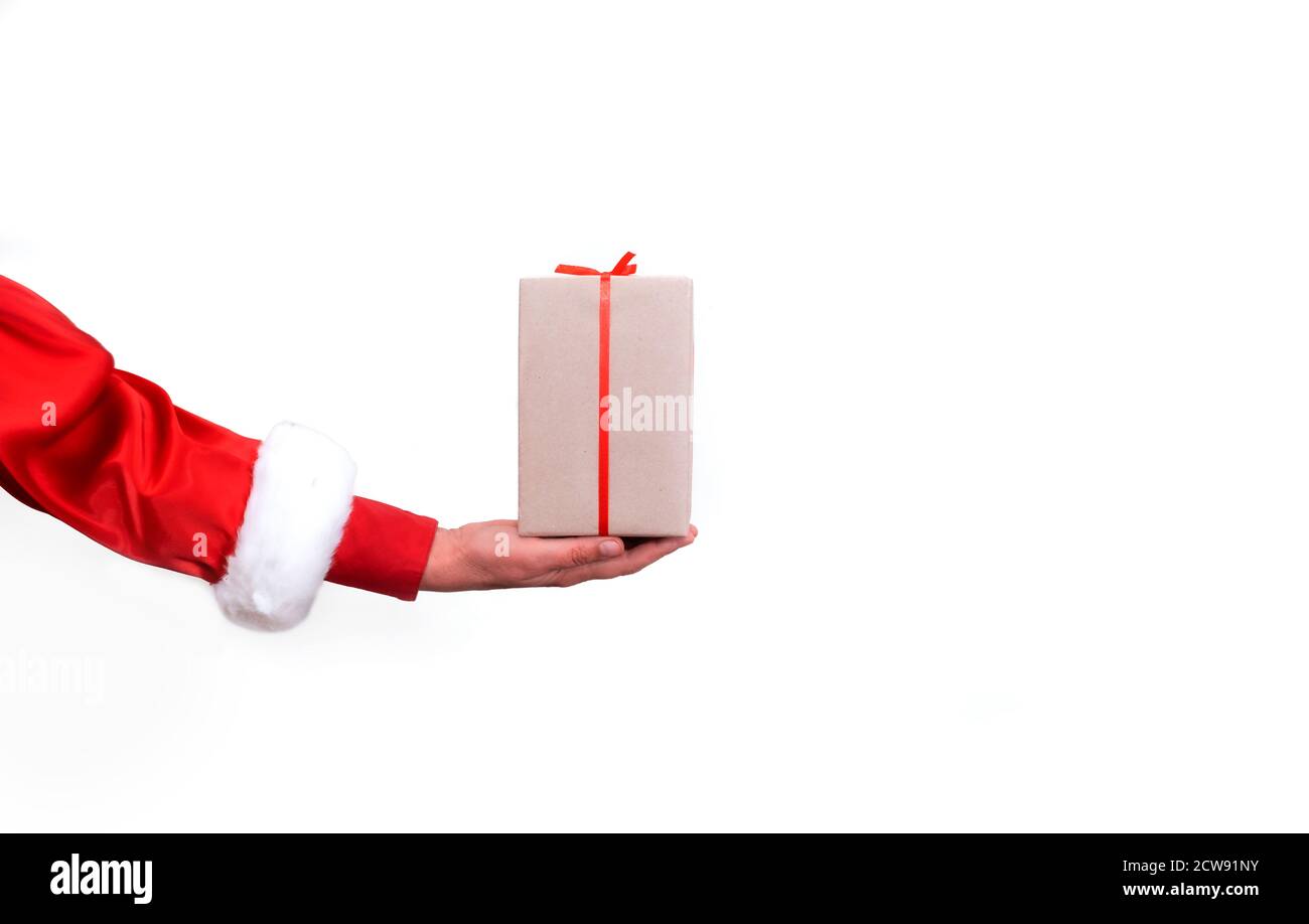 Hand of Santa Claus holds Packing boxes on the white background ...