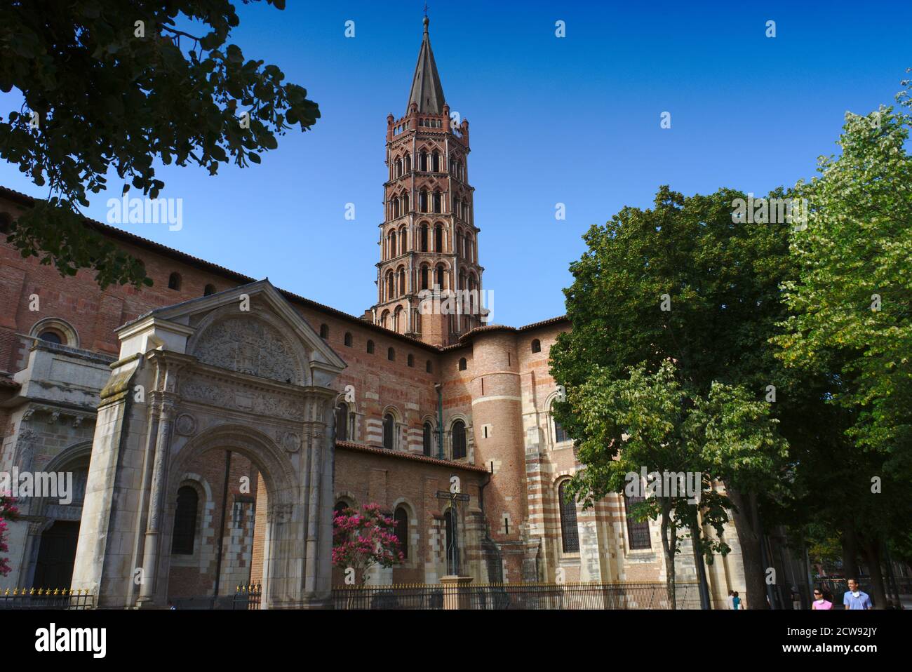 Toulouse, bell tower of the Saint-Sernin basilica and garden Stock Photo