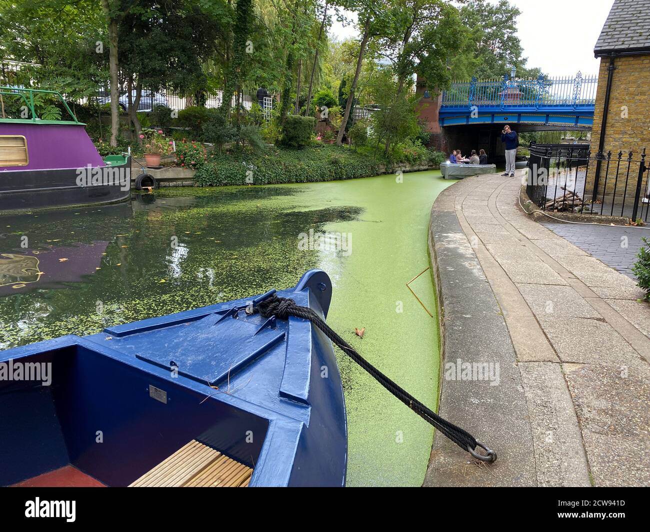 Picturesque narrow boats at Little Venice in London, England. Pretty house boats are moored on the canals near Maida Vale. A popular location for tour Stock Photo