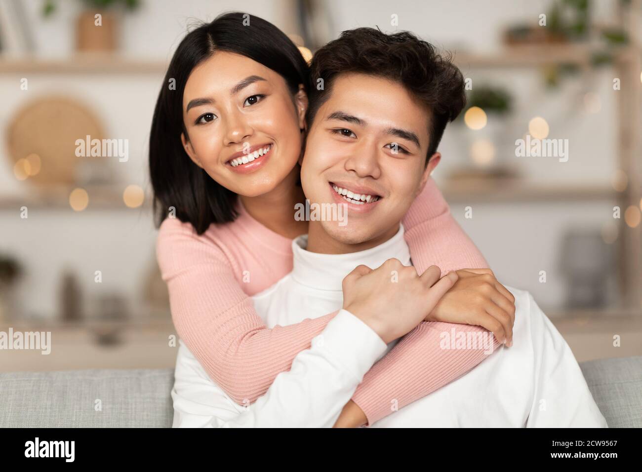 Relaxed Japanese Couple Chilling Together at Home, Using Gadgets Stock  Image - Image of married, cheerful: 249408669