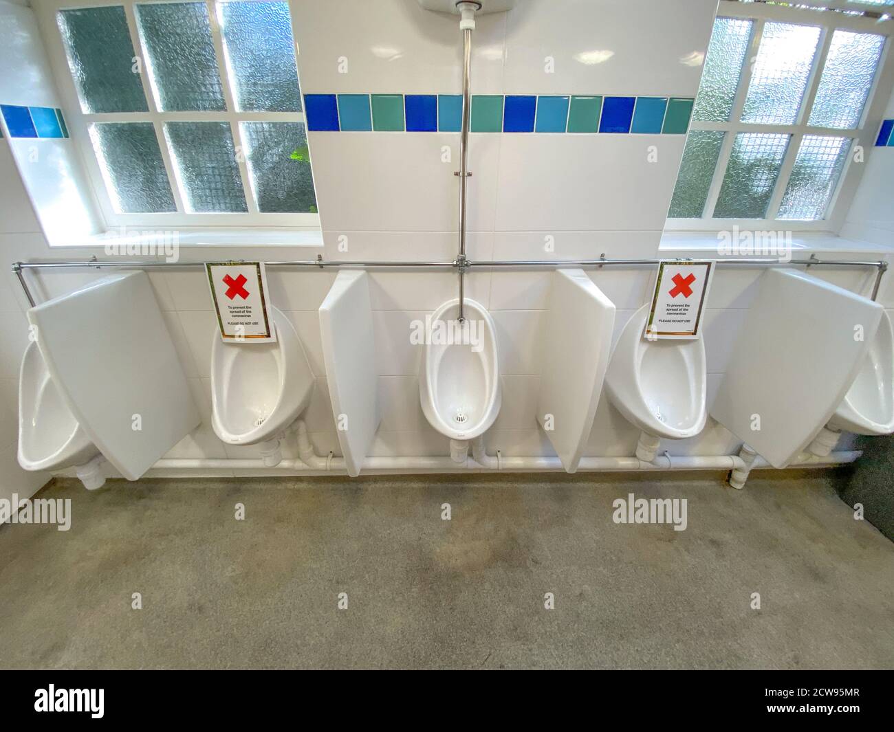 Social distancing signs in London toilets. Possible Covid19