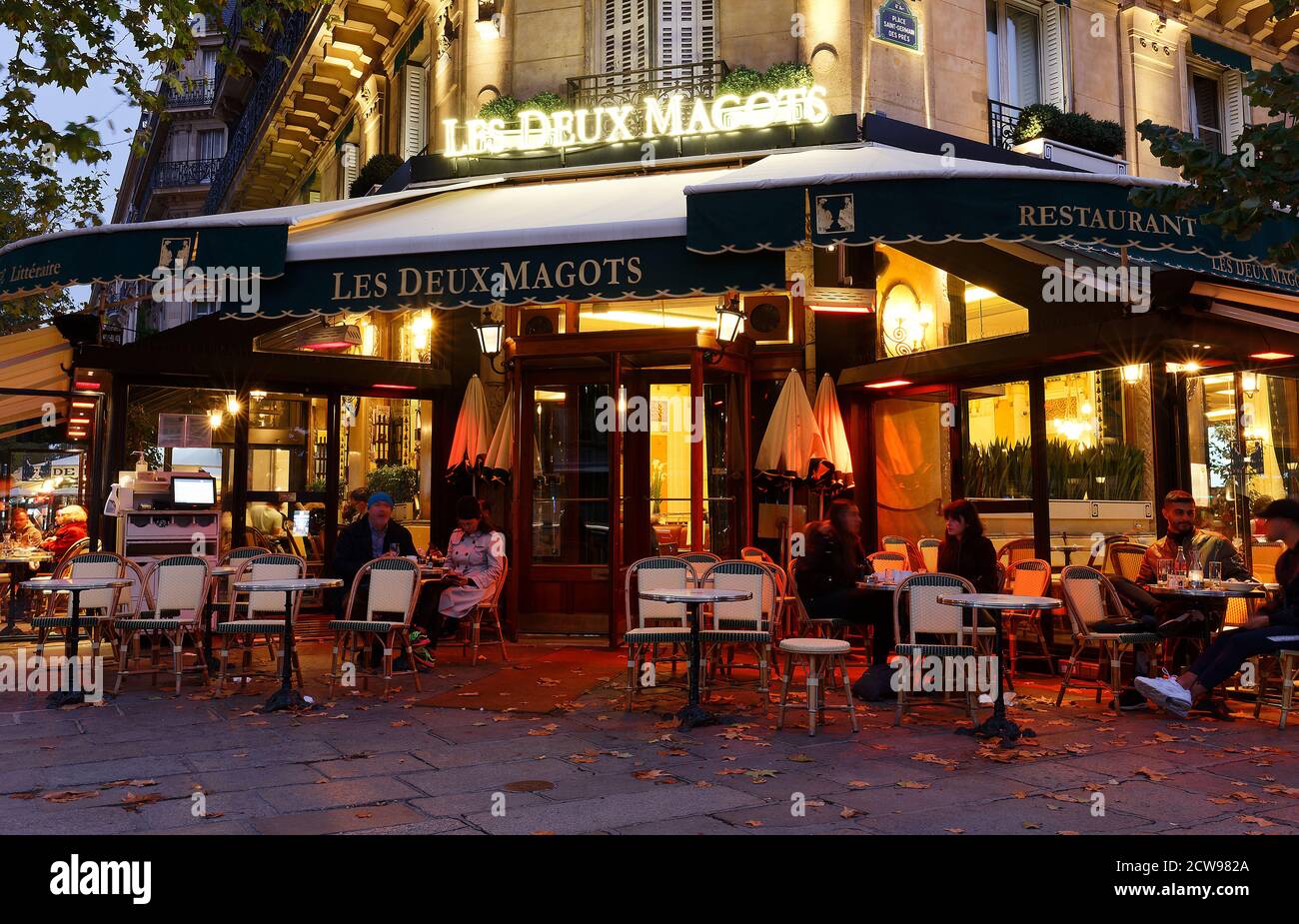 The famous cafe Les deux magots located on Saint-Germain boulevard .It ...