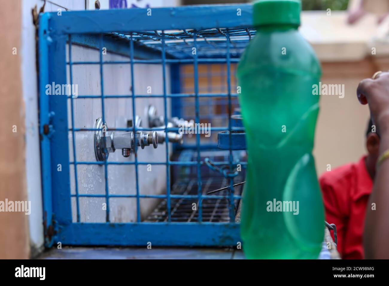 water source located near the entrance to the Hindu temples Stock Photo