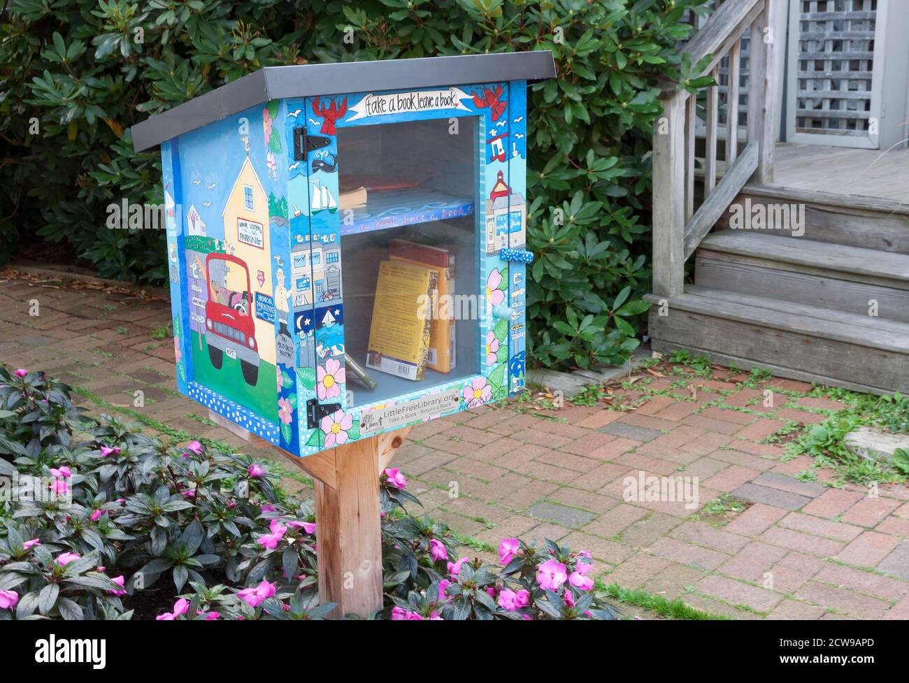 Take a Book, Leave a Book Box Sponsored by LittleFreeLibrary.org. Stock Photo