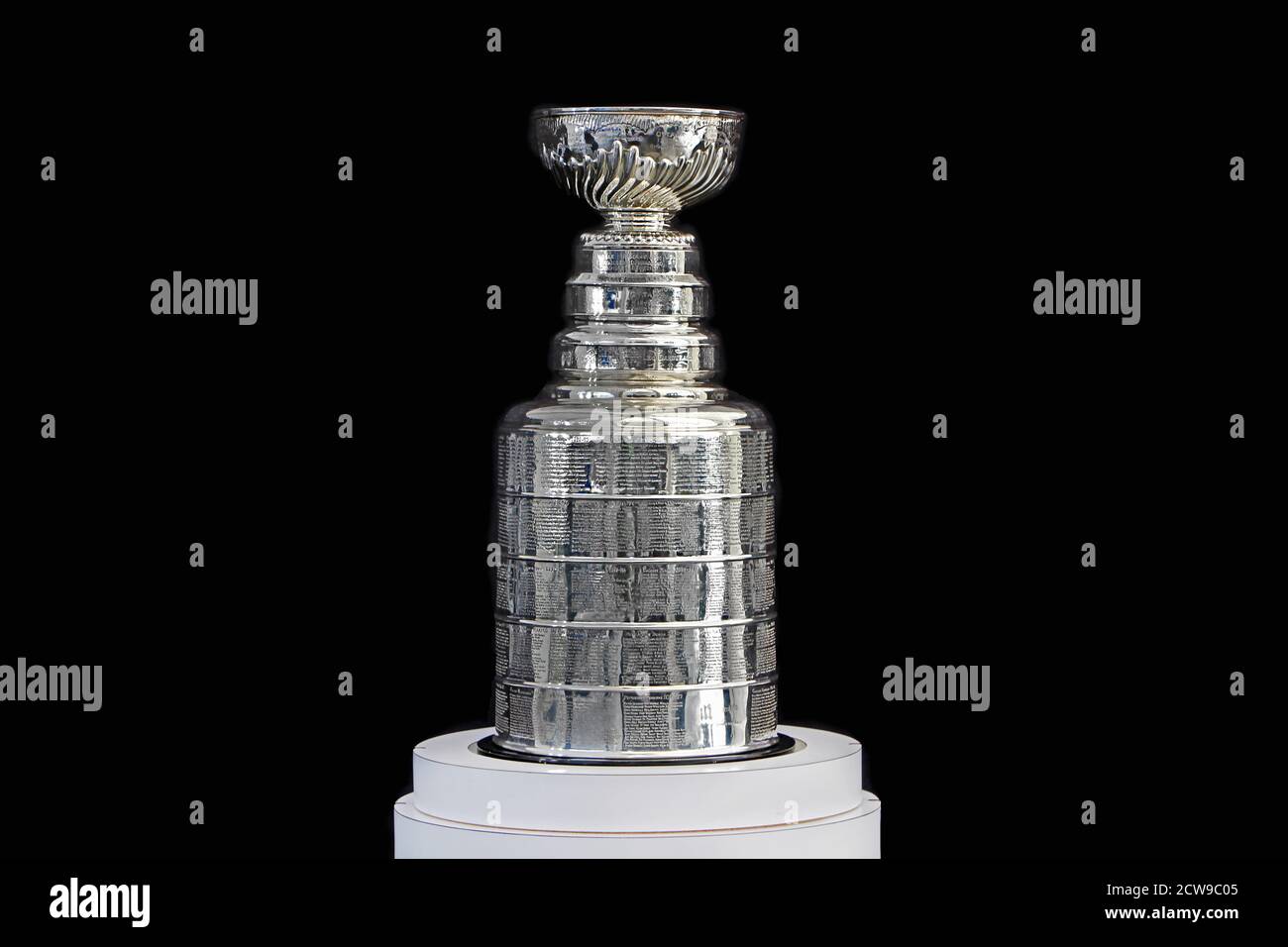 NHL Trophy - Silver Stanley Cup on white stand with black background, in Vancouver, BC on October 22, 2017 Stock Photo