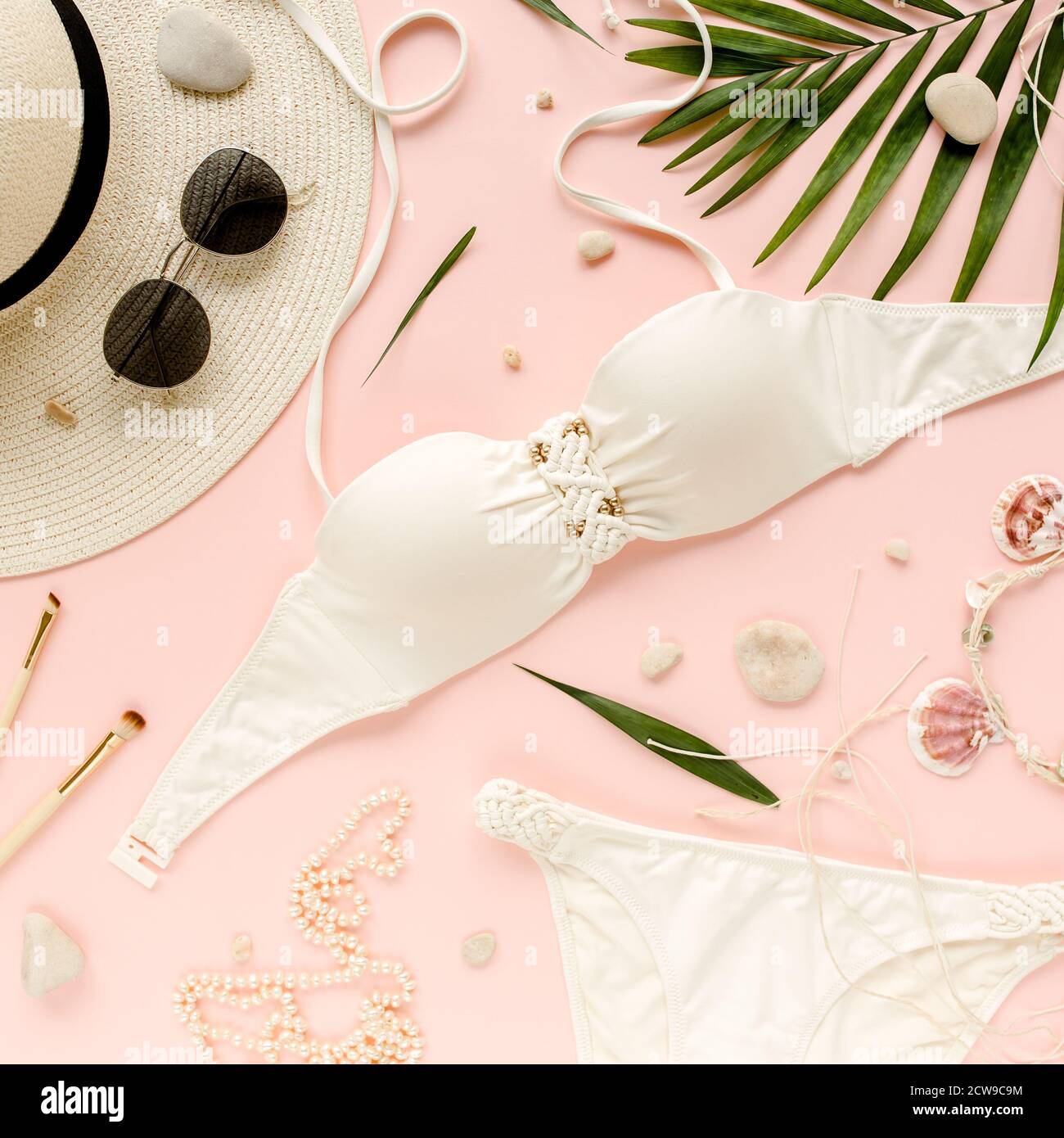 pink swimsuit with palm leaves