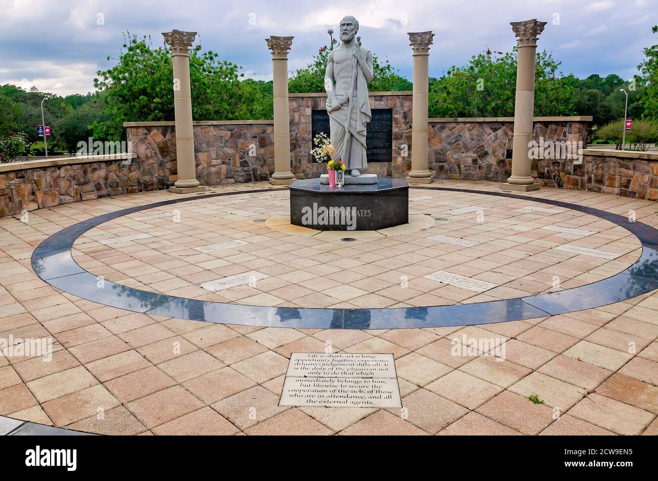 A statue of Hippocrates stands in Hippocrates Park on the campus of the University of South Alabama, Sept. 26, 2020, in Mobile, Alabama. Stock Photo