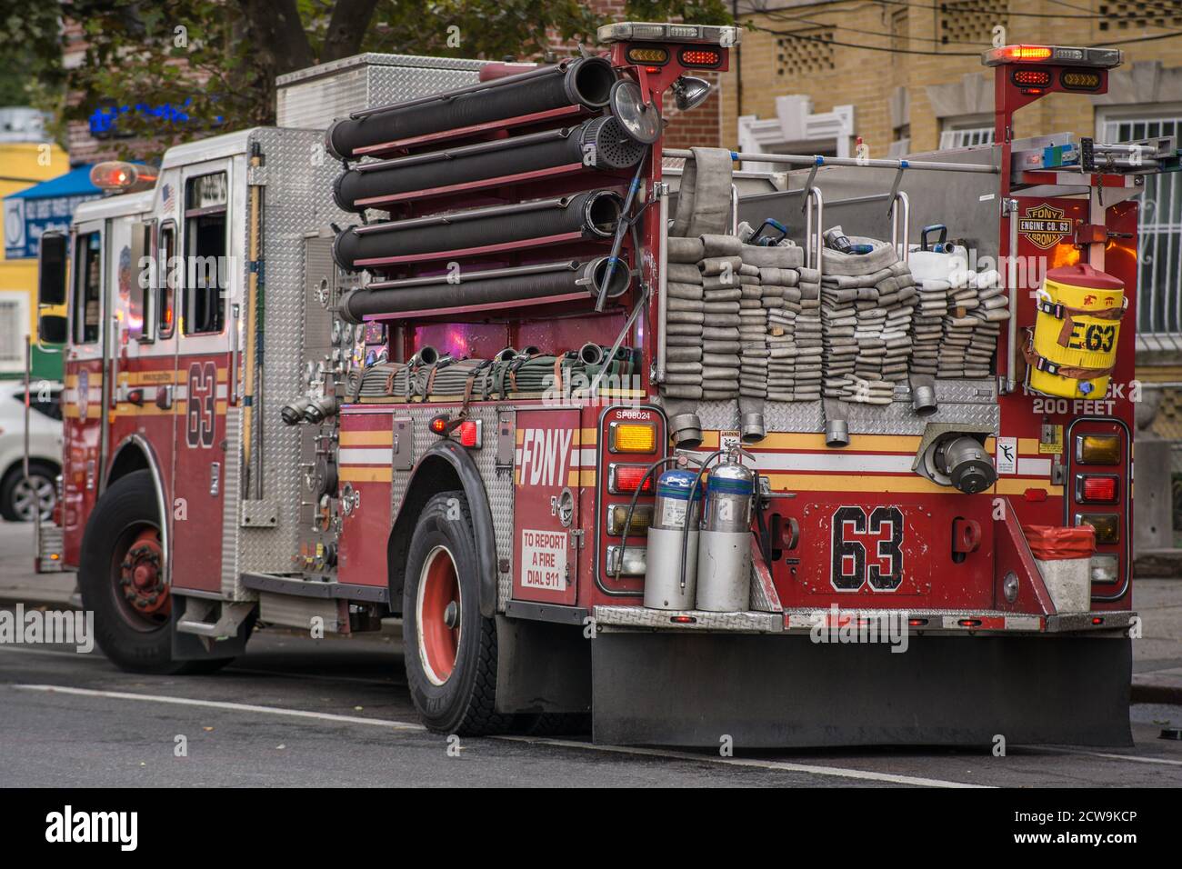 New York City Fire fighters rescue three children from a burning ...