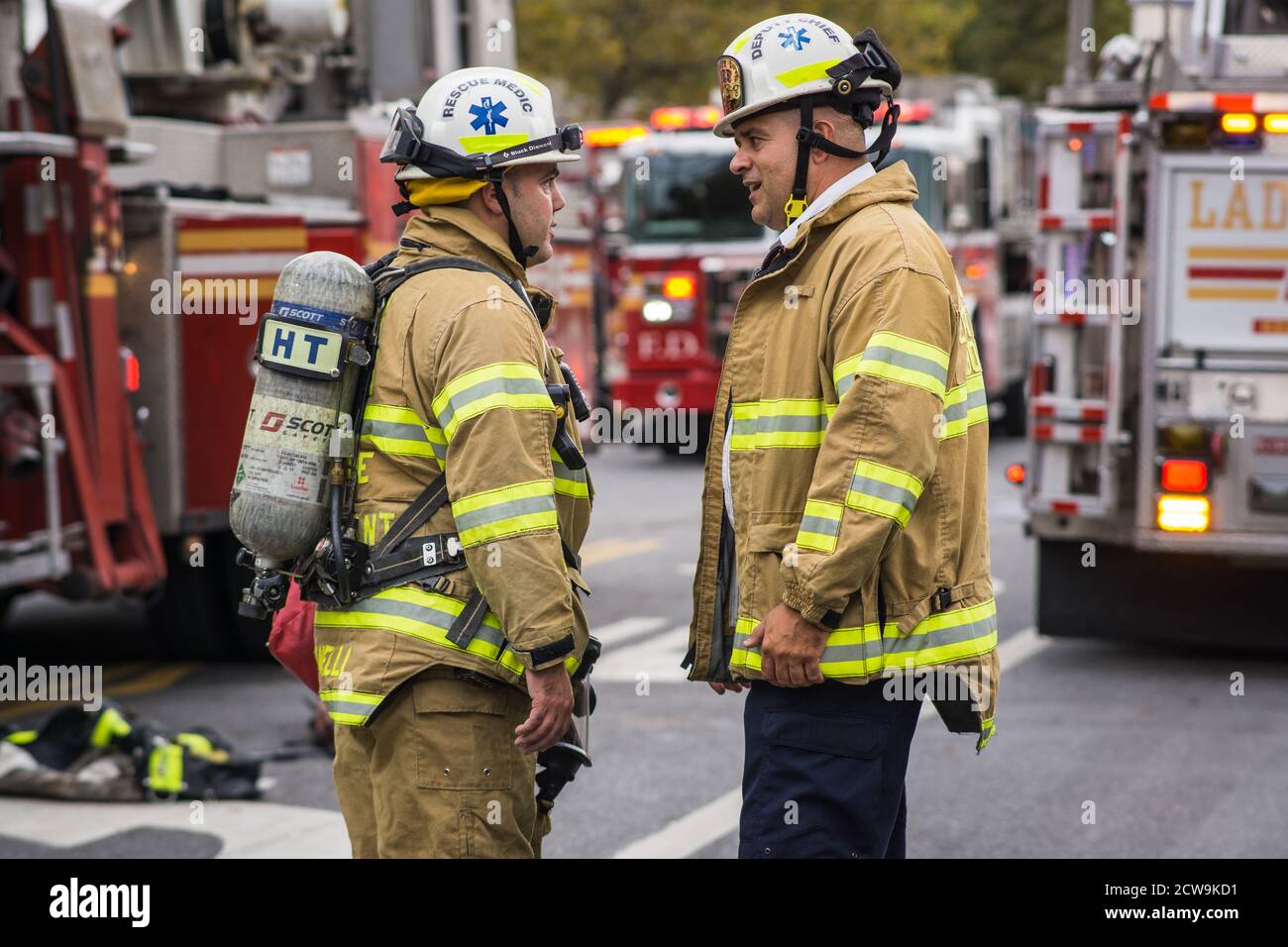 New York City Fire fighters rescue three children from a burning ...