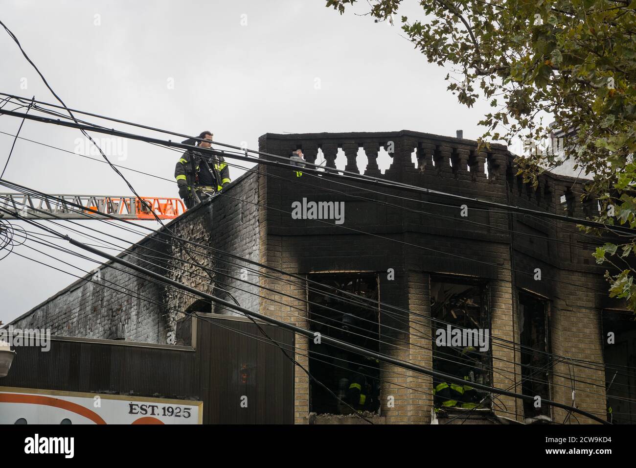 New York City Fire fighters rescue three children from a burning ...