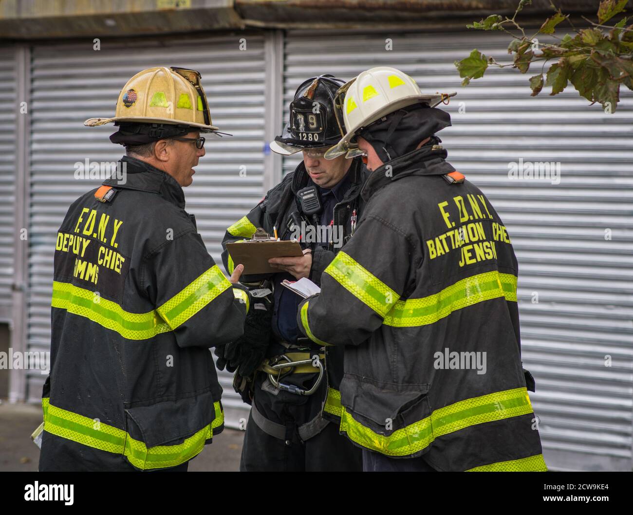 New York City Fire fighters rescue three children from a burning ...