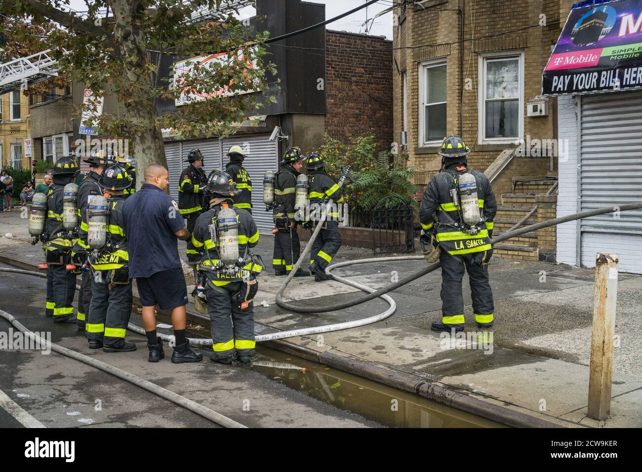 New York City Fire fighters rescue three children from a burning ...