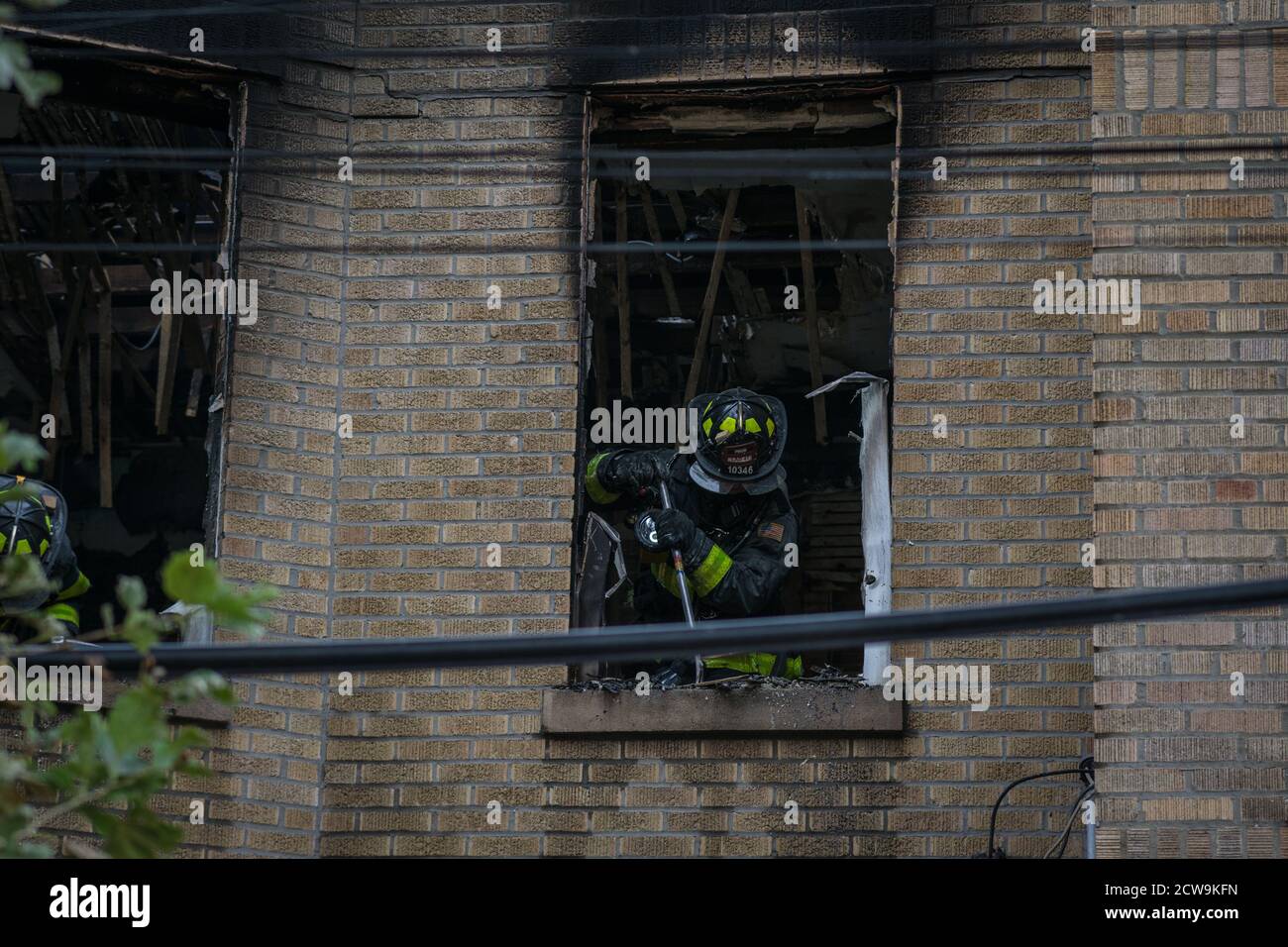 New York City Fire fighters rescue three children from a burning ...