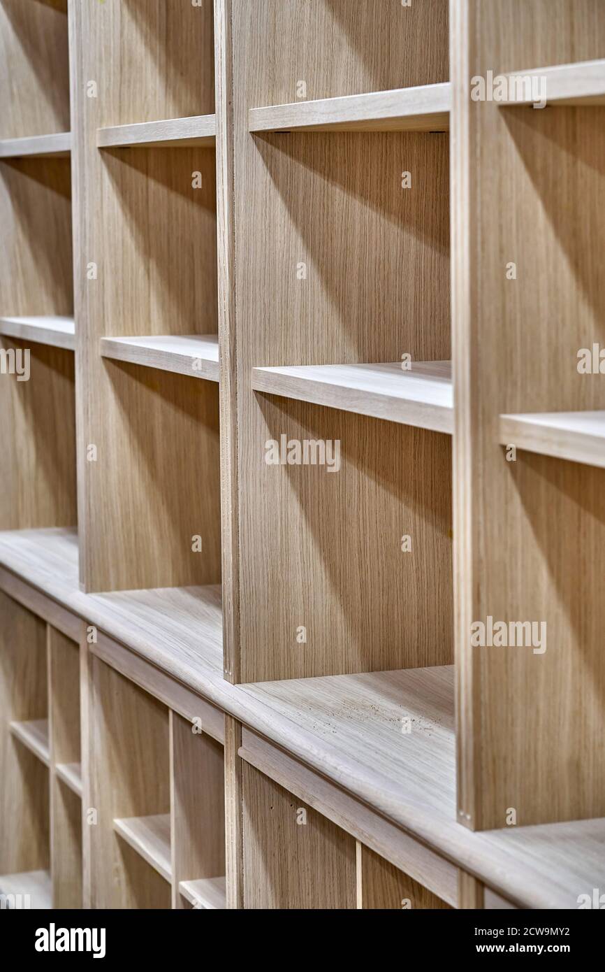Modern joinery. Wooden bookcases in process of production in