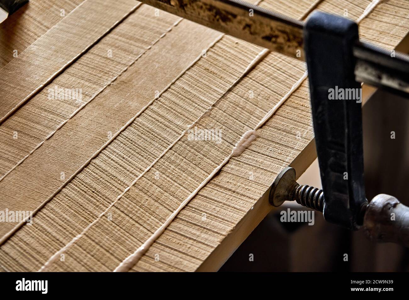 Joinery. Gluing and clamping wooden panels. Wooden furniture