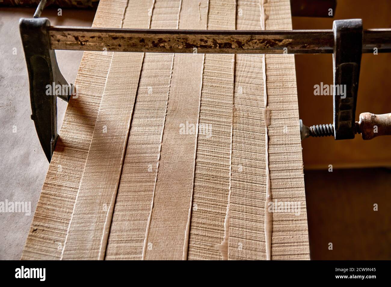 Joinery. Gluing and clamping wooden panels. Wooden furniture