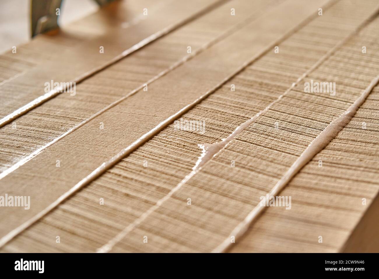 Joinery. Gluing and clamping wooden panels. Wooden furniture