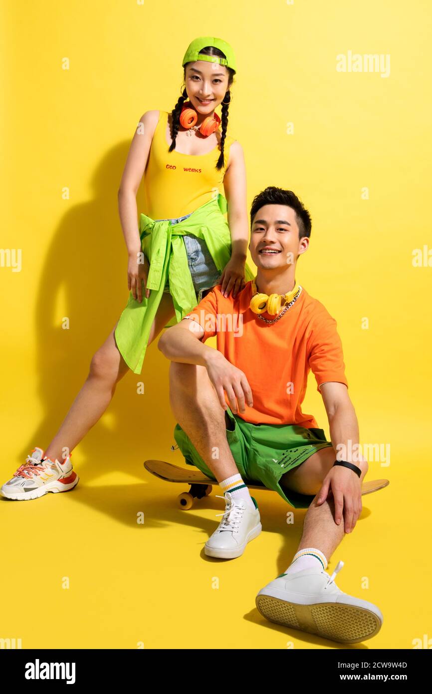 Young couples portrait of skateboarding Stock Photo