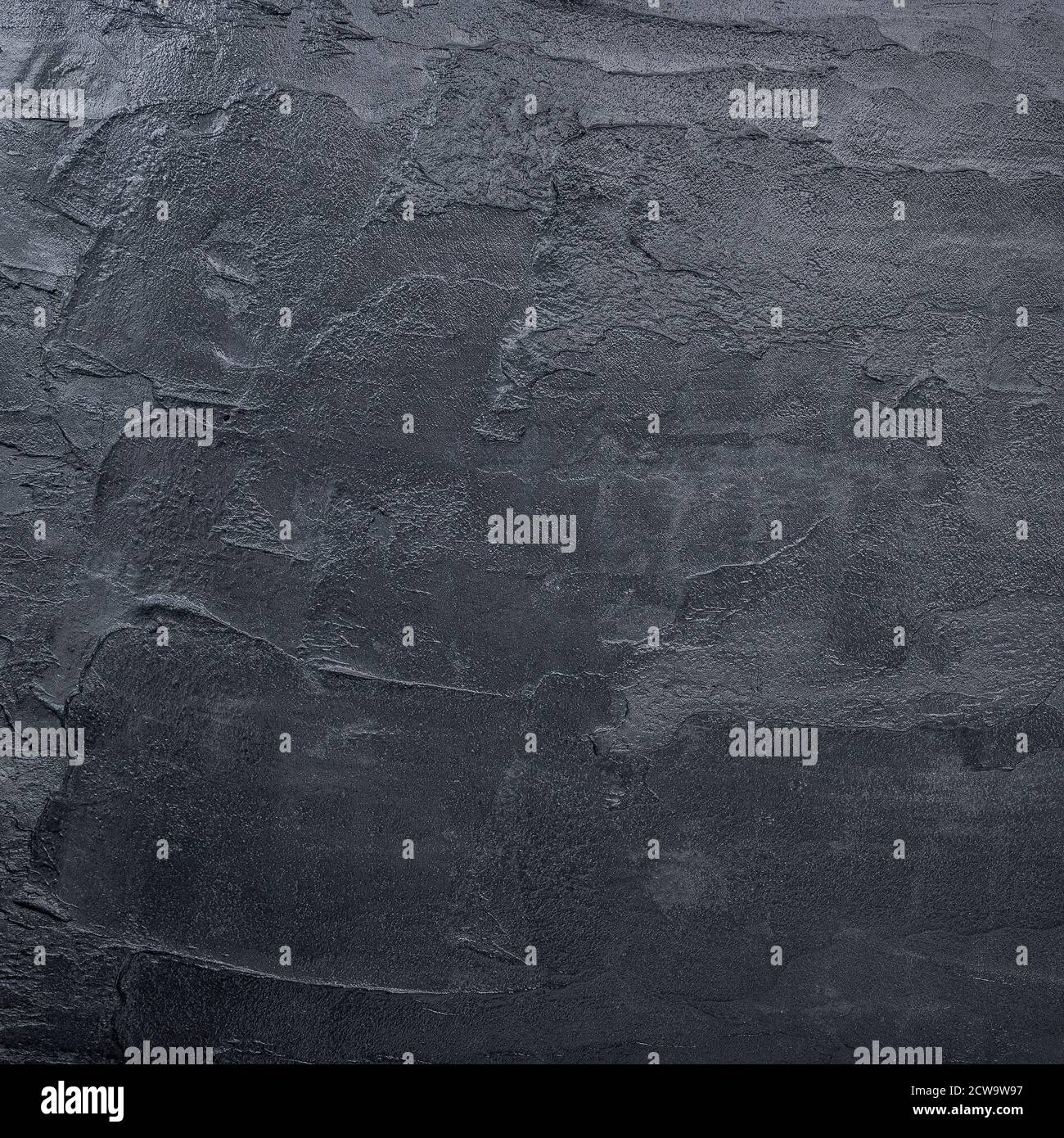 Dark black concrete wall texture background. Natural black slate concrete  background pattern. Stock Photo