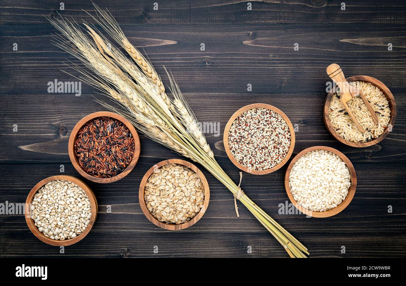 Various natural organic cereal and whole grains seed in wooden bowl for