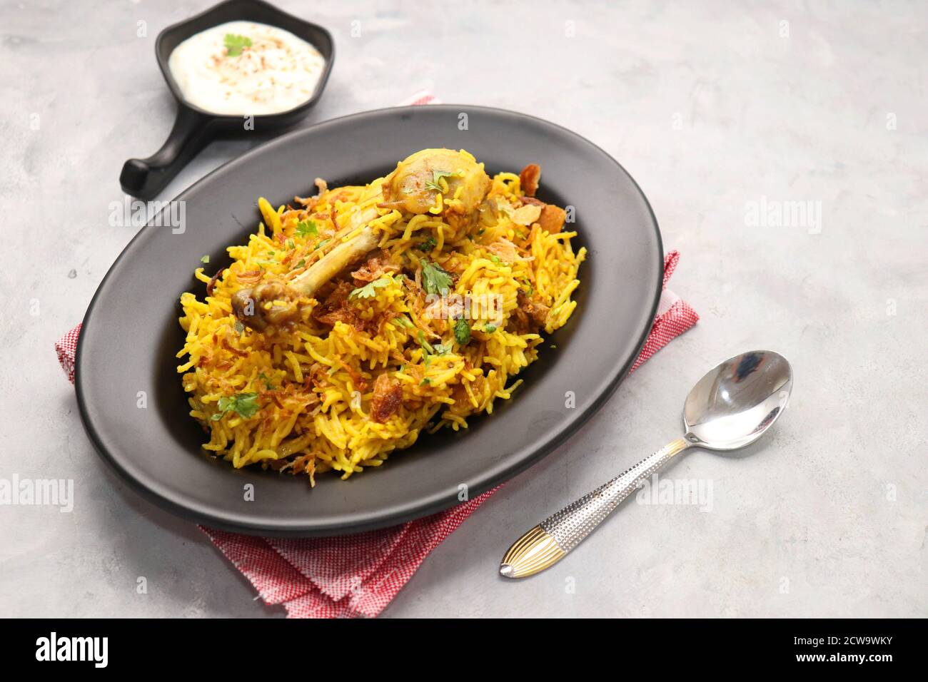 Chicken Biryani, Chicken Pulav. Garnished with fried onion & coriander