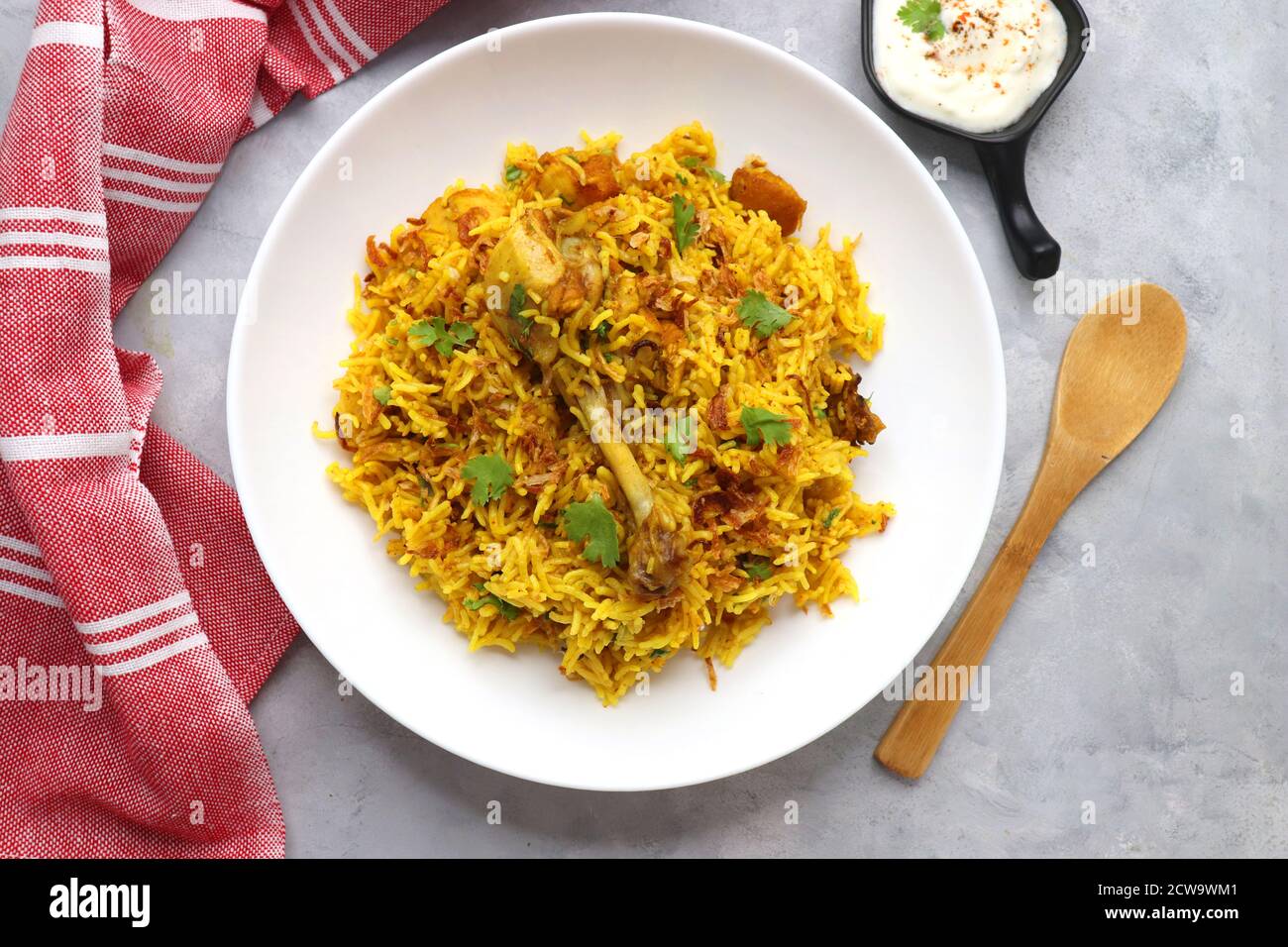 Chicken Biryani, Chicken Pulav. Garnished with fried onion & coriander