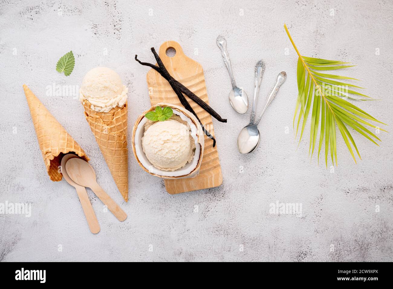 Coconut Ice Cream Flavours In Half Of Coconut Setup On White Stone Background Summer And Sweet Menu Concept Stock Photo Alamy