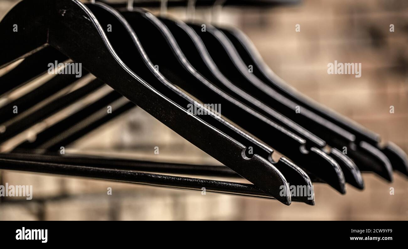 Wooden coat hanger clothes. Fashionable different types of hanger. Many