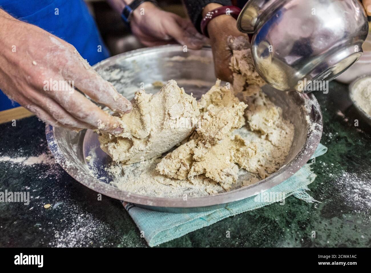 Kneading dough to make paratha, India Stock Photo Alamy