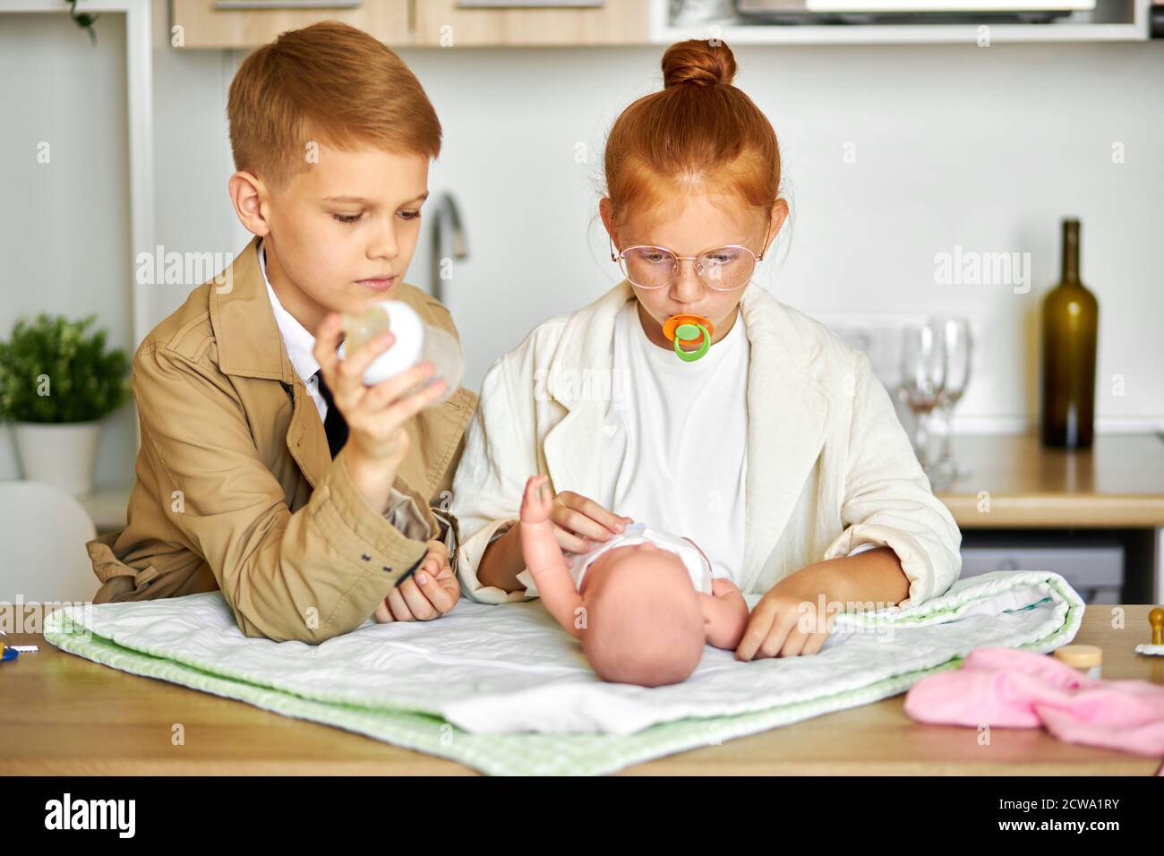 Young Parents Children Take Care Of Baby Kids Make Family Love Their Newborn Baby At Home Kids As Adults Stock Photo Alamy
