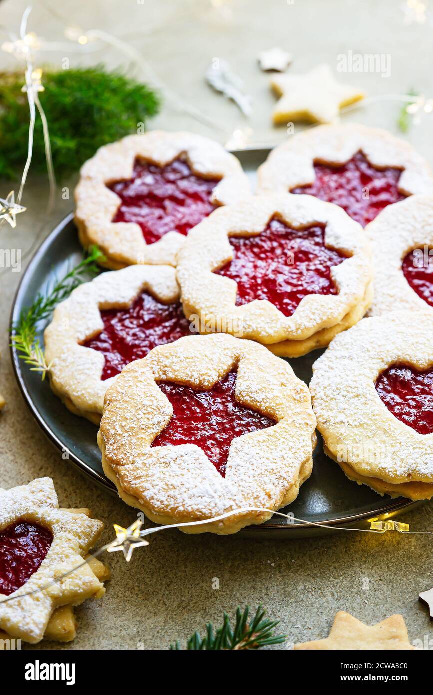 Plate With Christmas Or New Year Shortcrust Cookies With Red Jam Traditional Festive Austrian Cookies With Jam Linzer Cookies Stock Photo Alamy