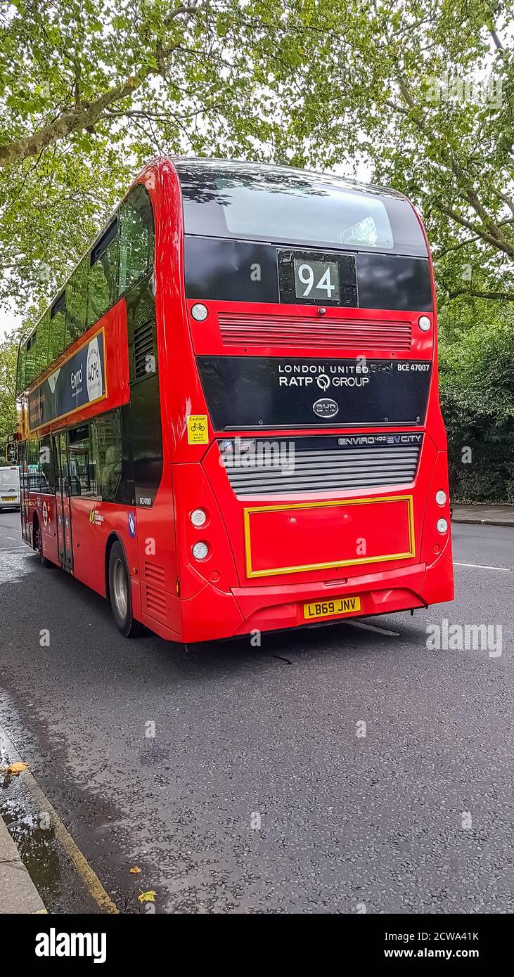 London, UK - July 8, 2020: Modern red double-decker bus is waiting for people in central London. Bus 94. Stock Photo