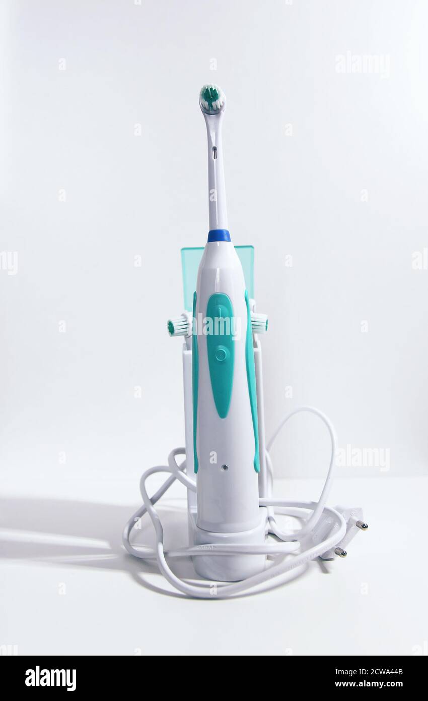 Electrical toothbrush on a white background. Stock Photo