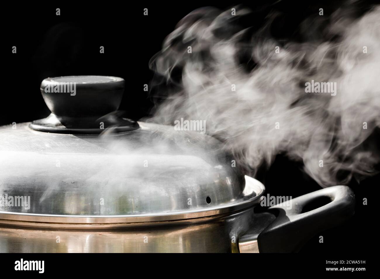 steam over cooking pot Stock Photo Alamy