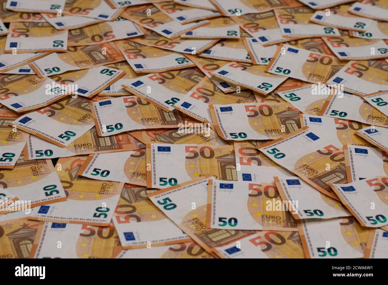 A lot of 50 euro banknotes spread out over the floor. You can use this as a  unique background. Also copy space available Stock Photo - Alamy