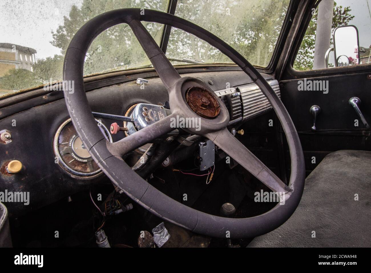 Sevierville, Tennessee, USA - August 15, 2020: Decaying interior dashboard of an antique Chevrolet truck. Stock Photo