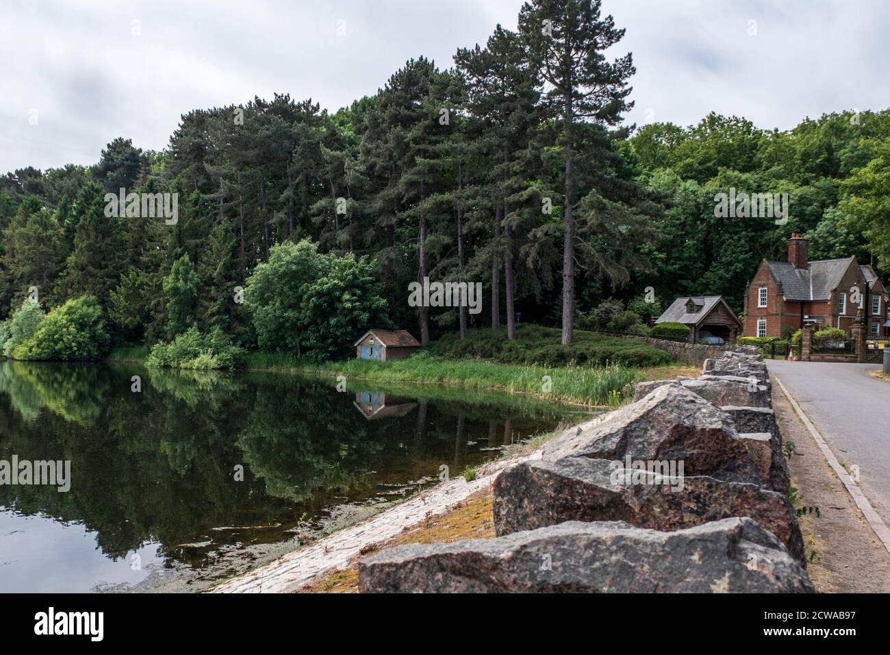 The boathouse on Swithland Reservoir, a reservoir in the English county of Leicestershire. The Great Central Railway crosses over it. Stock Photo