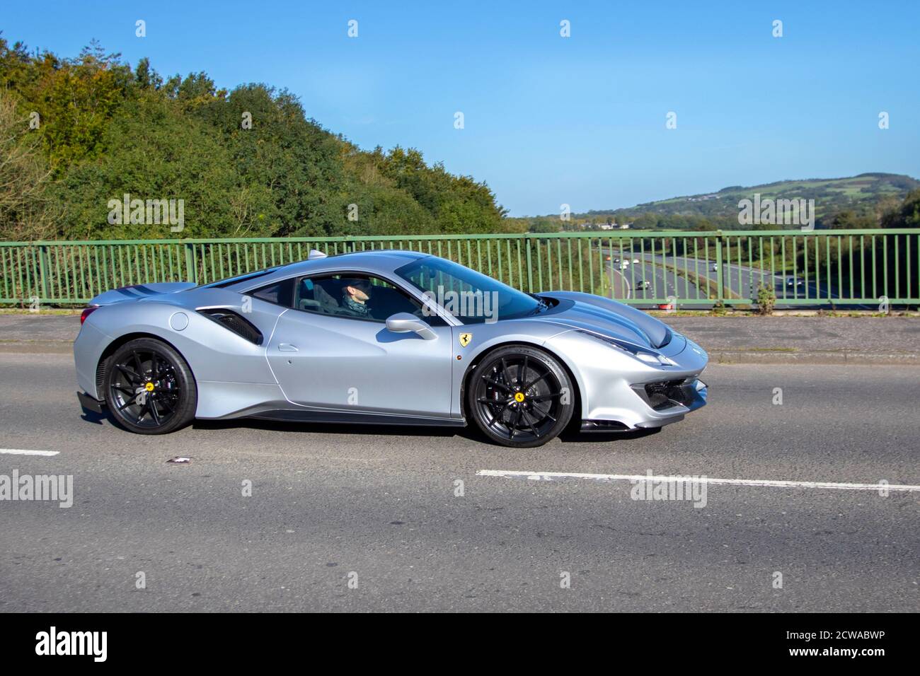 2019 silver Ferrari 488 Pista S-A; Vehicular traffic, moving vehicles,  cars, vehicle driving on UK roads, motors, motoring on the M6 motorway  highway road network Stock Photo - Alamy