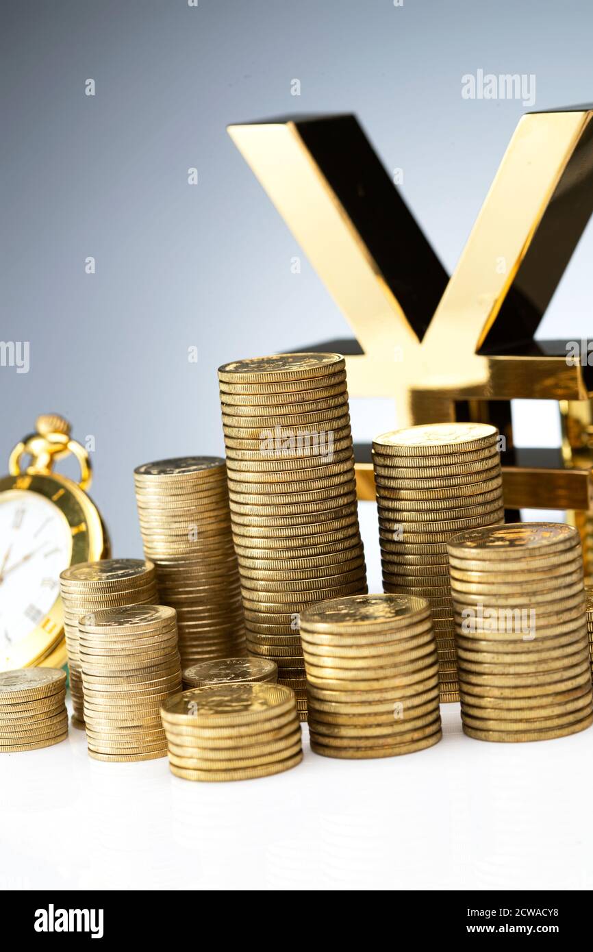 Gold currency symbol and pocket watch Stock Photo Alamy