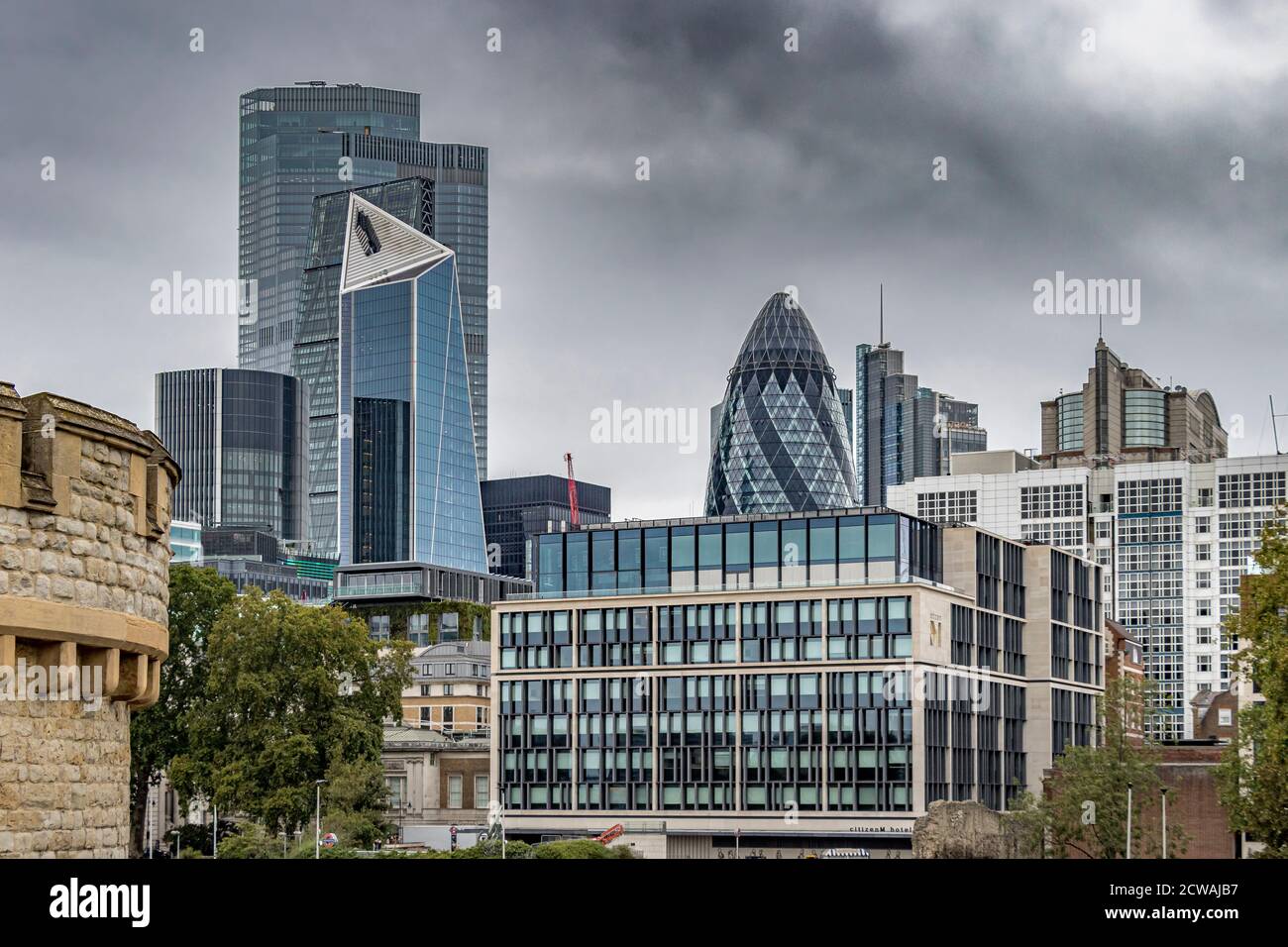 Skyscrapers in The City Of London , seen from inside the walls and battlements of The Tower Of 
