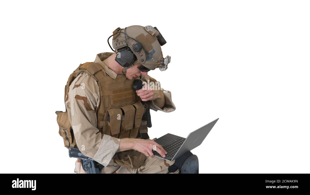 Soldier Using Laptop Computer for Surveillance During Military O Stock Photo