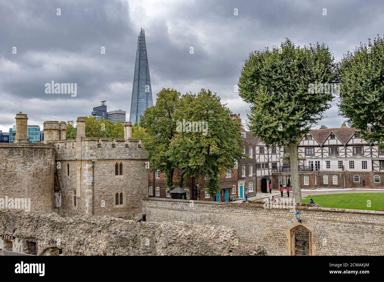 The Queen's House with The Shard in the distance seen from inside The Tower Of London ,London EC3 Stock Photo