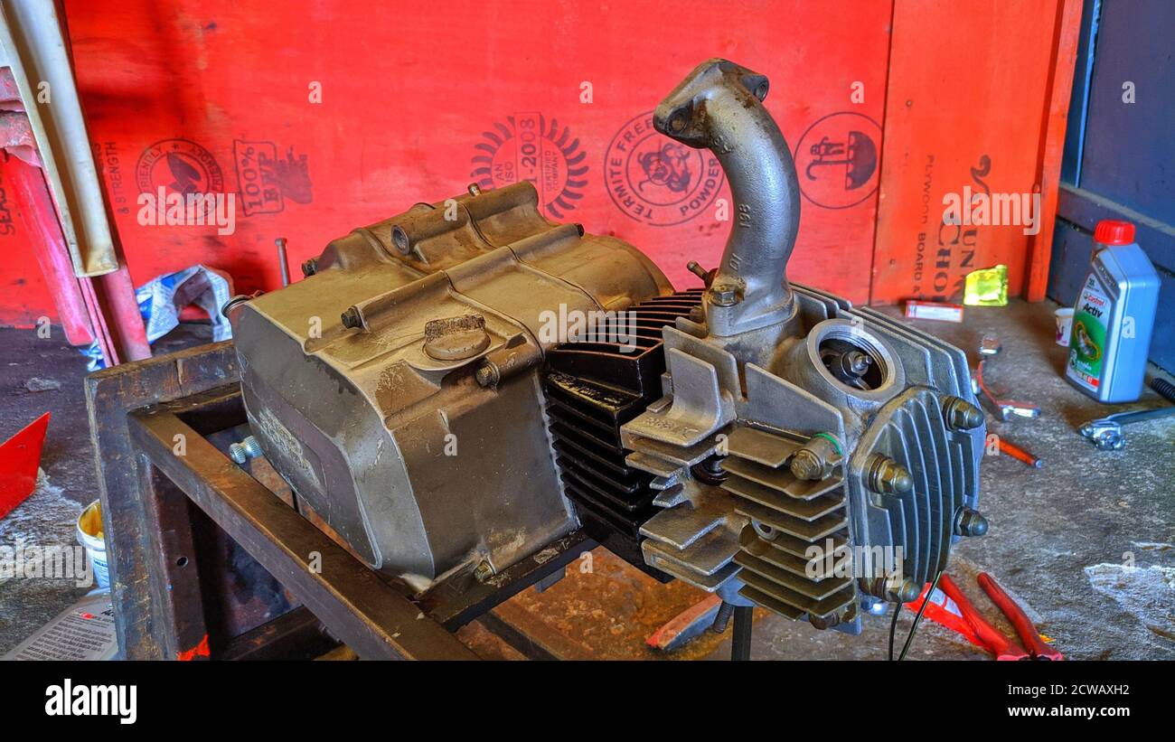 28 September 2020 : Reengus, Jaipur, India : Engine of Hero honda splendor motorcycle. Engine repairing in a two wheeler workshop. Stock Photo