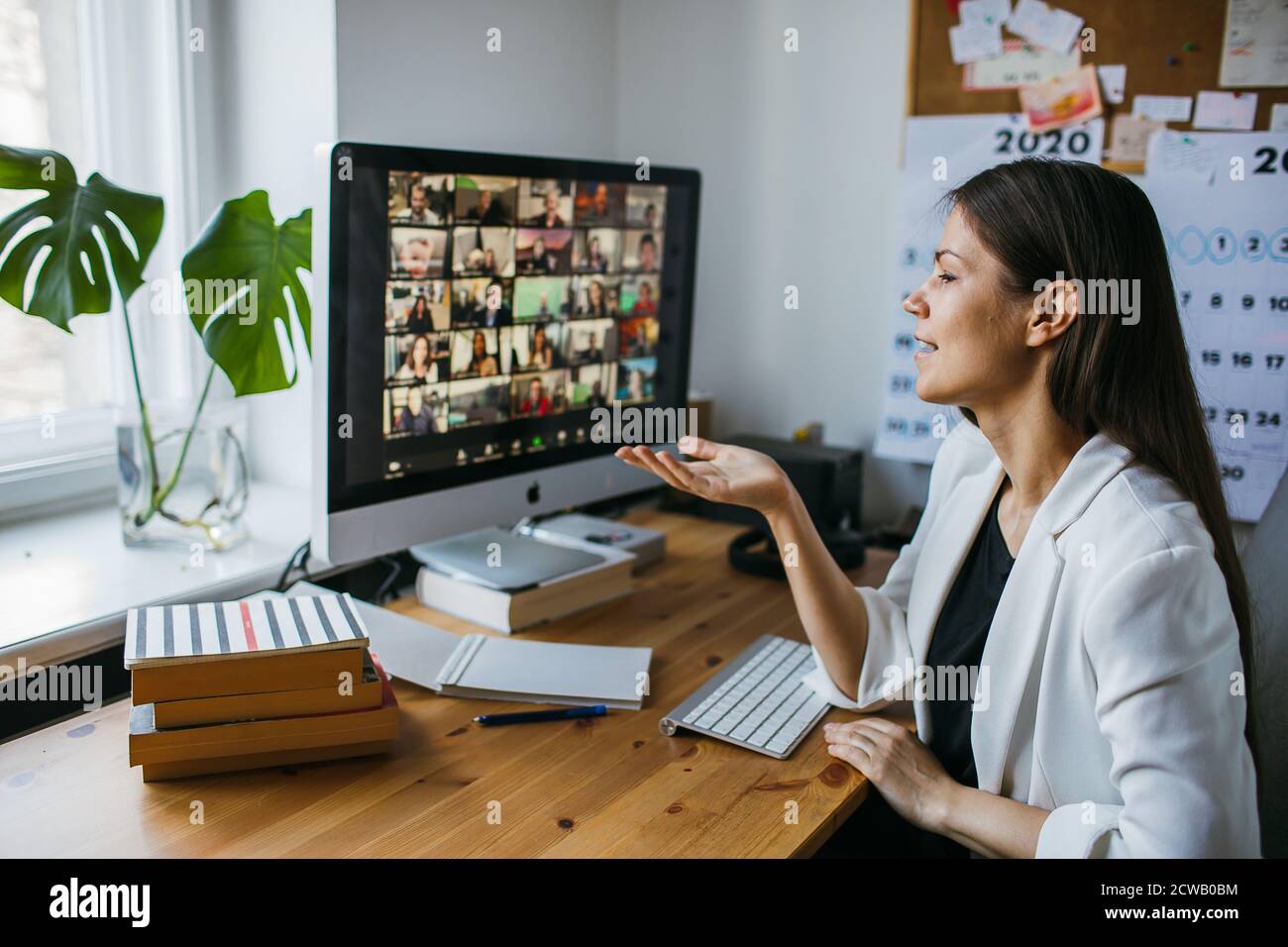 Business woman having Zoom video conference call via computer. Home office.  Stay at home and work from home concept during Coronavirus pandemic meet  Stock Photo - Alamy