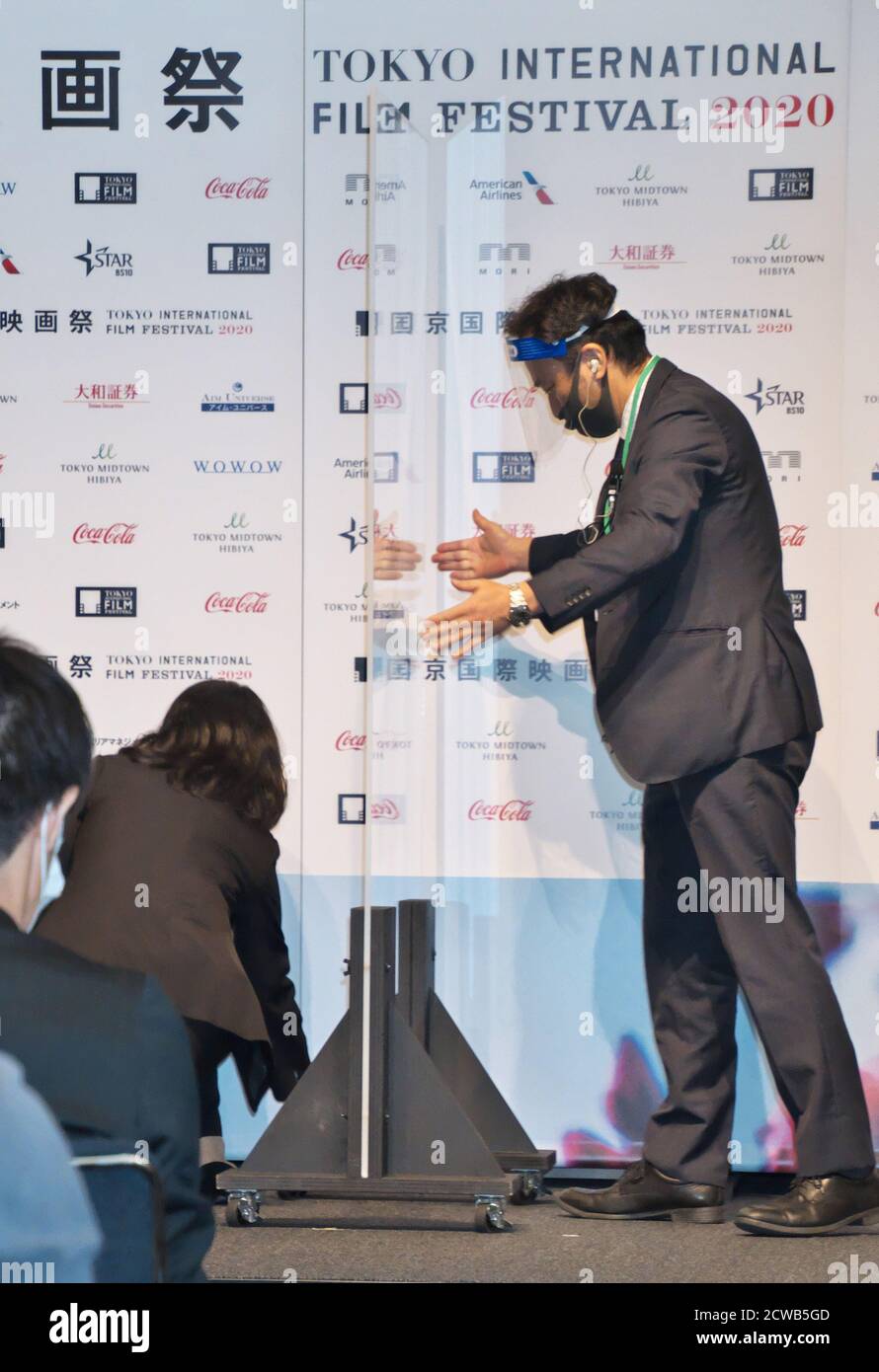 Staff member sets the acrylic board on the stage during the press conference for the Tokyo International Film Festival 2020 in Tokyo, Japan on Tuesday, September 29, 2020. This year's Tokyo festival is held on October 31st to November 9th collaborate with Tokyo Filmex. 25 films are world premieres, and the remaining seven films Asian premieres in this event.     Photo by Keizo Mori/UPI Stock Photo