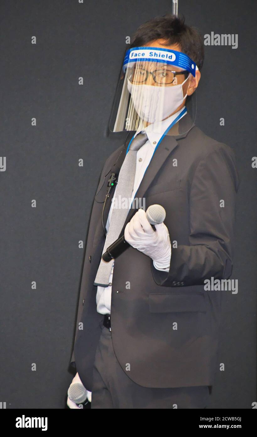 Staff member is seen wearing face shield, face masks and gloves during the press conference for the Tokyo International Film Festival 2020 in Tokyo, Japan on Tuesday, September 29, 2020. This year's Tokyo festival is held on October 31st to November 9th collaborate with Tokyo Filmex. 25 films are world premieres, and the remaining seven films Asian premieres in this event.     Photo by Keizo Mori/UPI Stock Photo