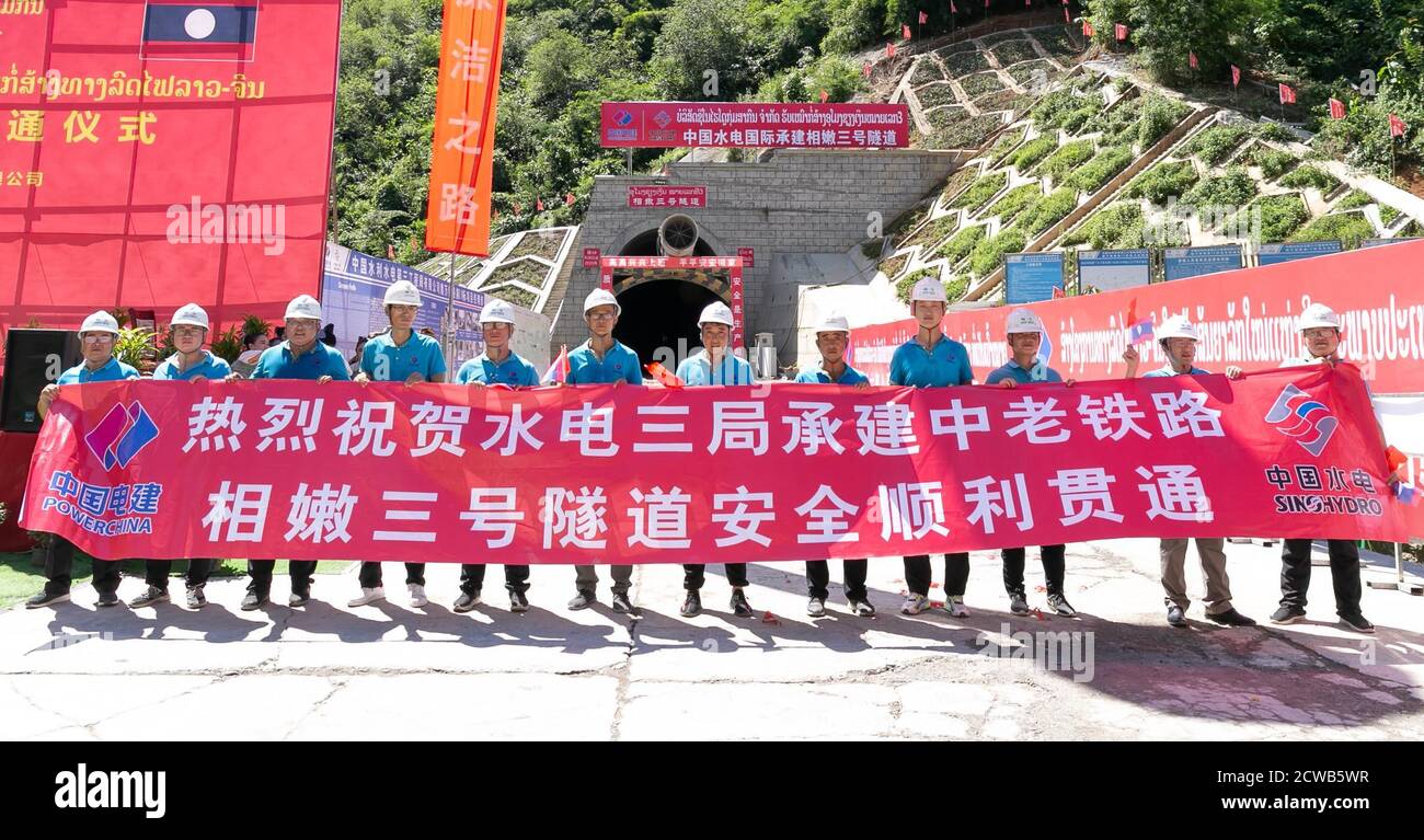 Vientiane, Laos. 29th Sep, 2020. A ceremony is held to celebrate the drilling through of the Xiang Ngeun No. 3 Tunnel in Luang Prabang Province, Laos, Sept. 29, 2020. Xiang Ngeun No. 3 Tunnel, the last tunnel along the China-Laos Railway, was drilled through on Tuesday. So far, all the 75 tunnels across the China-Laos Railway have been holed. The successful completion of the tunnels indicates that the controlling factors affecting the China-Laos railway project have basically been removed. Credit: Kaikeo Saiyasane/Xinhua/Alamy Live News Stock Photo